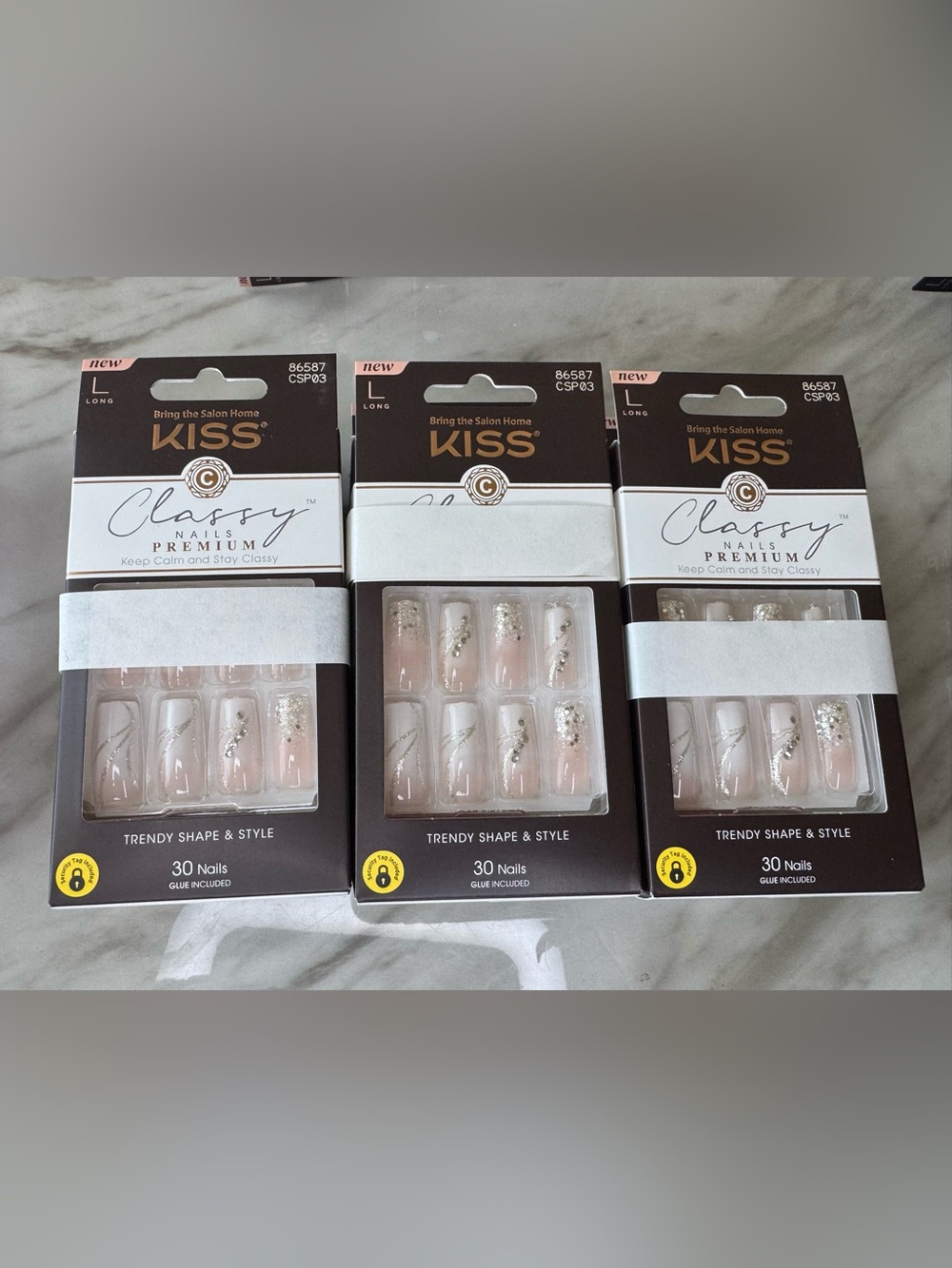 6 Kiss Press-On Nails in Pink, White & Silver Glitter Accent Kits